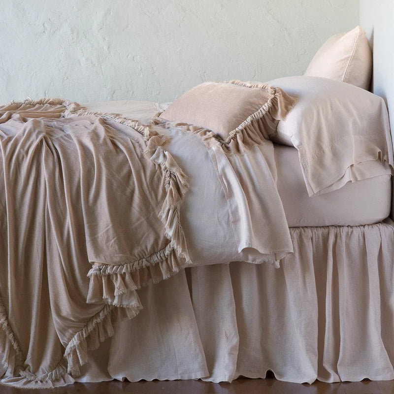 Bella Notte Loulah throw blanket with soft, cozy fabric in warm autumn tones, perfect for adding comfort to your living space.