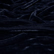 Bella Notte Loulah Throw Blanket in soft, cozy fabric, shown draped for a warm, inviting look.