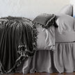Bella Notte Loulah Throw Blanket with plush, cozy fabric in autumn colors, perfect for adding warmth and style to a living space.