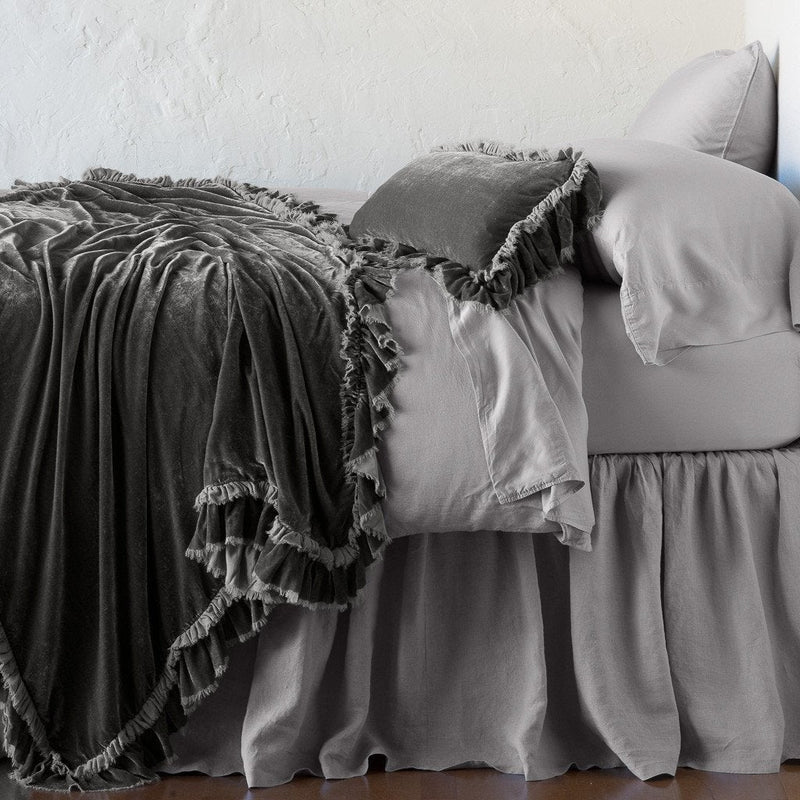 Bella Notte Loulah Throw Blanket with plush, cozy fabric in autumn colors, perfect for adding warmth and style to a living space.