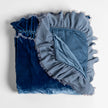 Bella Notte Loulah throw blanket in cozy autumn tones, soft and plush fabric perfect for adding warmth and style to your space.