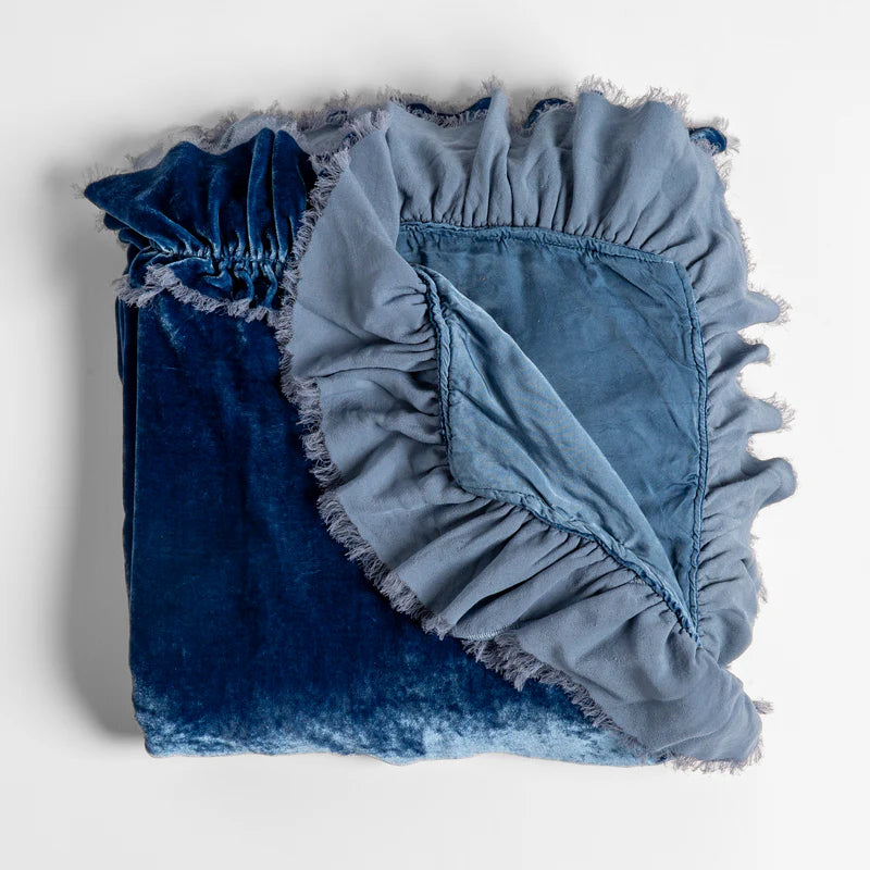 Bella Notte Loulah throw blanket in cozy autumn tones, soft and plush fabric perfect for adding warmth and style to your space.