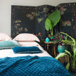 Bella Notte silk velvet quilted throw blanket with a luxurious, soft texture in rich autumn tones.
