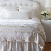 Bella Notte Carmen silk velvet throw blanket in winter white, showcasing soft, luxurious fabric and elegant drape.