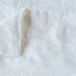 Bella Notte Lynette throw blanket in Tahoe Blue, soft and cozy fabric, displayed folded with textured details.