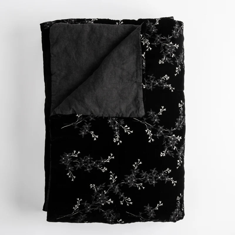 Bella Notte Lynette throw blanket in Tahoe Blue, soft and cozy fabric, draped for display.