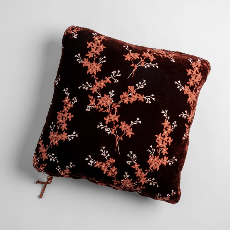 Bella Notte Lynette Throw Pillow with autumn-colored fabric, showcasing soft texture and decorative design.