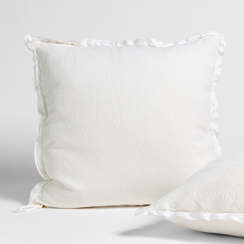 Bella Notte Trettino Sham in a cozy, textured fabric with a subtle autumn-inspired design, perfect for elegant bedroom decor.