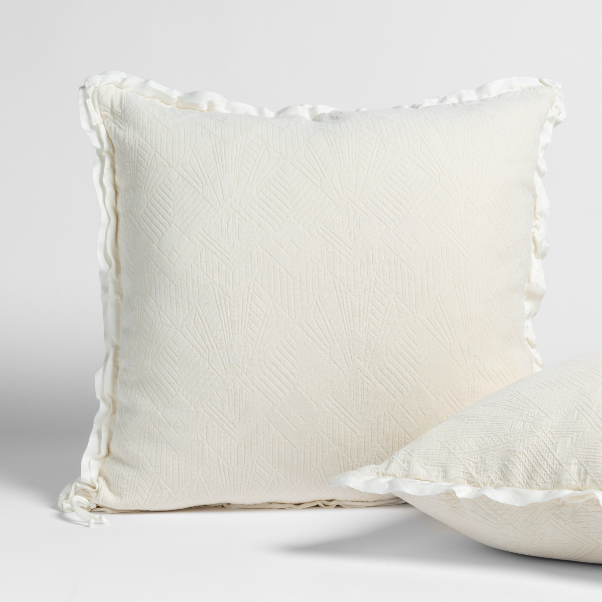Bella Notte Trettino Sham in autumn fabric, showcasing soft, luxurious textile with subtle pattern details.