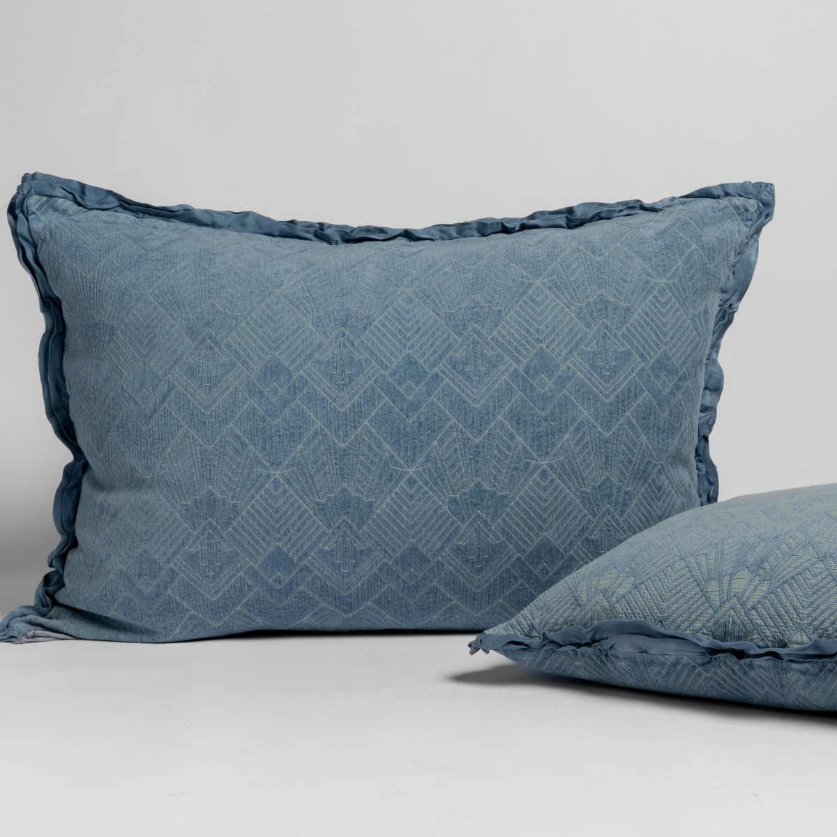 Bella Notte Trettino Sham in autumn-colored fabric, featuring soft, luxurious textile with elegant design.