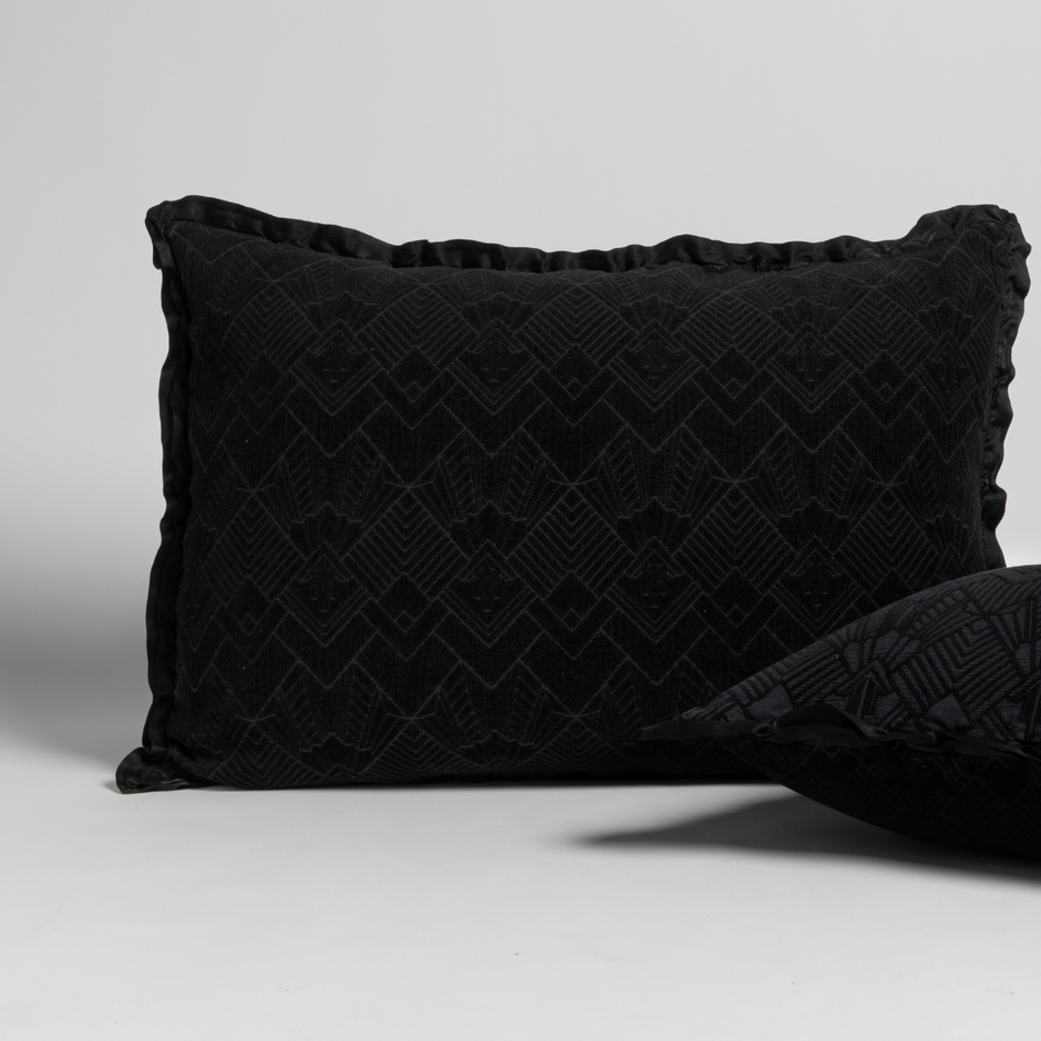 Bella Notte Trettino Sham in autumn-colored fabric with a soft, textured fabric and subtle embroidery detailing.