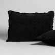 Bella Notte Trettino Sham in autumn-colored fabric with a soft, textured fabric and subtle embroidery detailing.