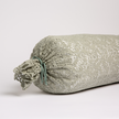 Bella Notte Allora Lace Bolster Cover on a throw pillow with delicate lace details and soft fabric in a cozy, elegant design.