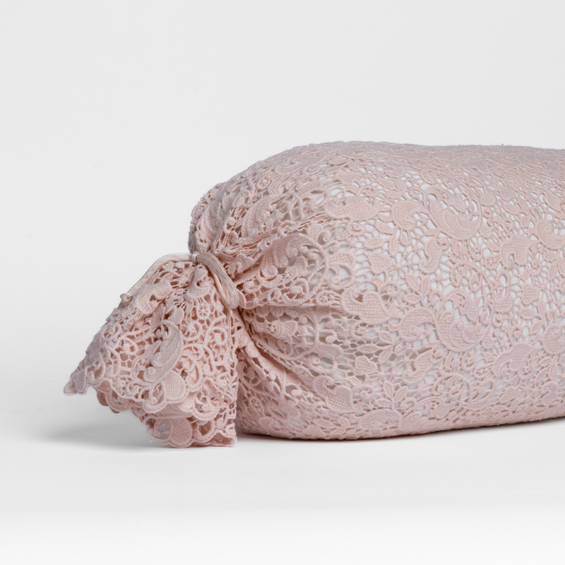 Bella Notte Allora Lace Bolster Cover on a throw pillow with intricate lace design for elegant bedroom decor.