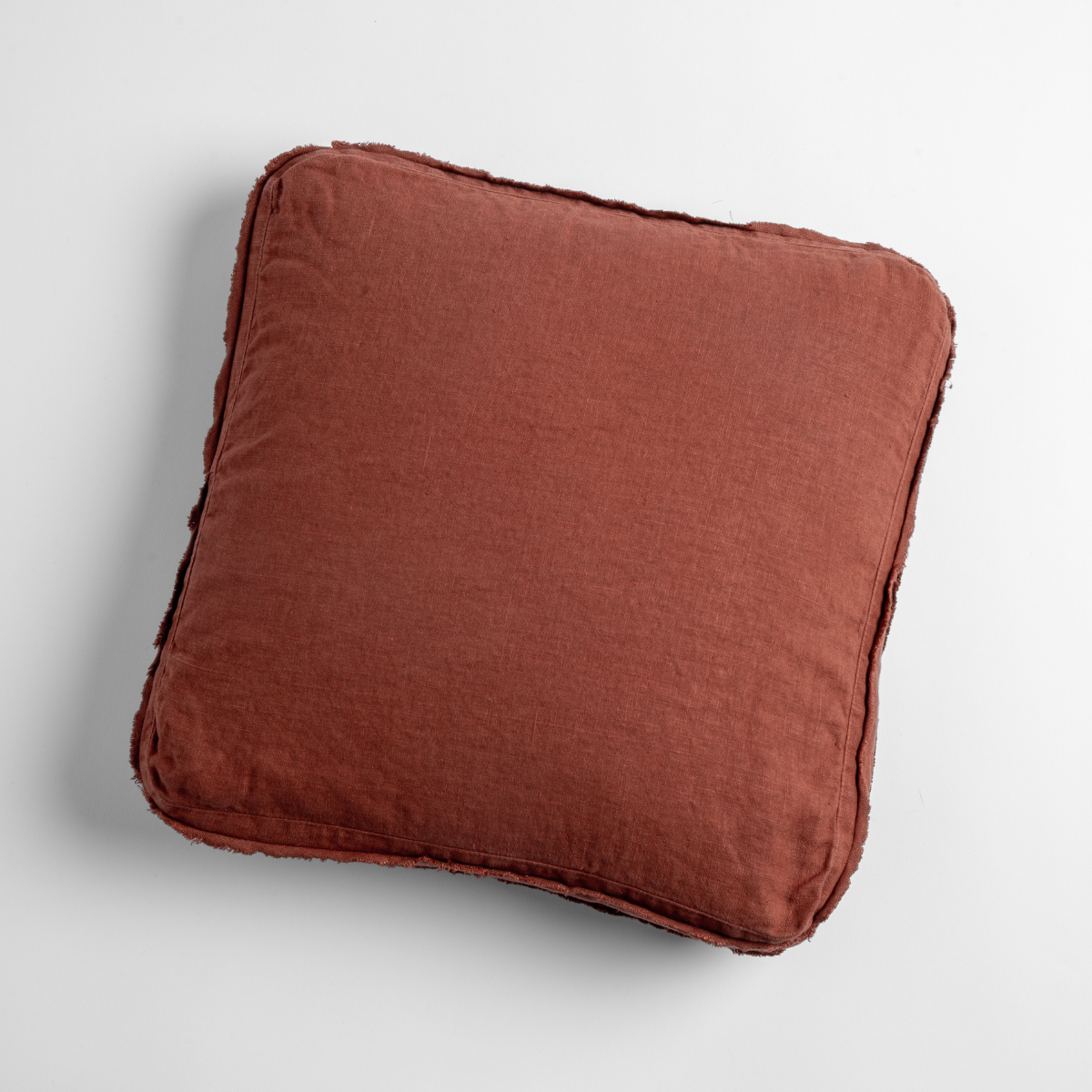 Bella Notte Austin throw pillow featuring autumn-inspired fabric with warm, cozy tones and textured design.