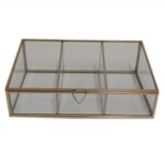 Elegant glass and brass box with a multi-section design, ideal for jewelry or small storage, by BIDK.
