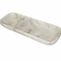 White marble organic-shaped rectangular bowl by BIDK, featuring smooth edges and elegant marble pattern on a clean surface.