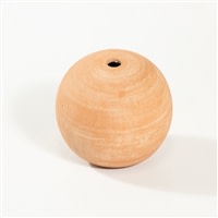 Small terra cotta sphere by BIDK, round decorative ceramic sculpture with warm earthy tones and smooth surface detail.