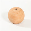 Small terra cotta sphere by BIDK, smooth round decorative ceramic sculpture with warm earthy tones.
