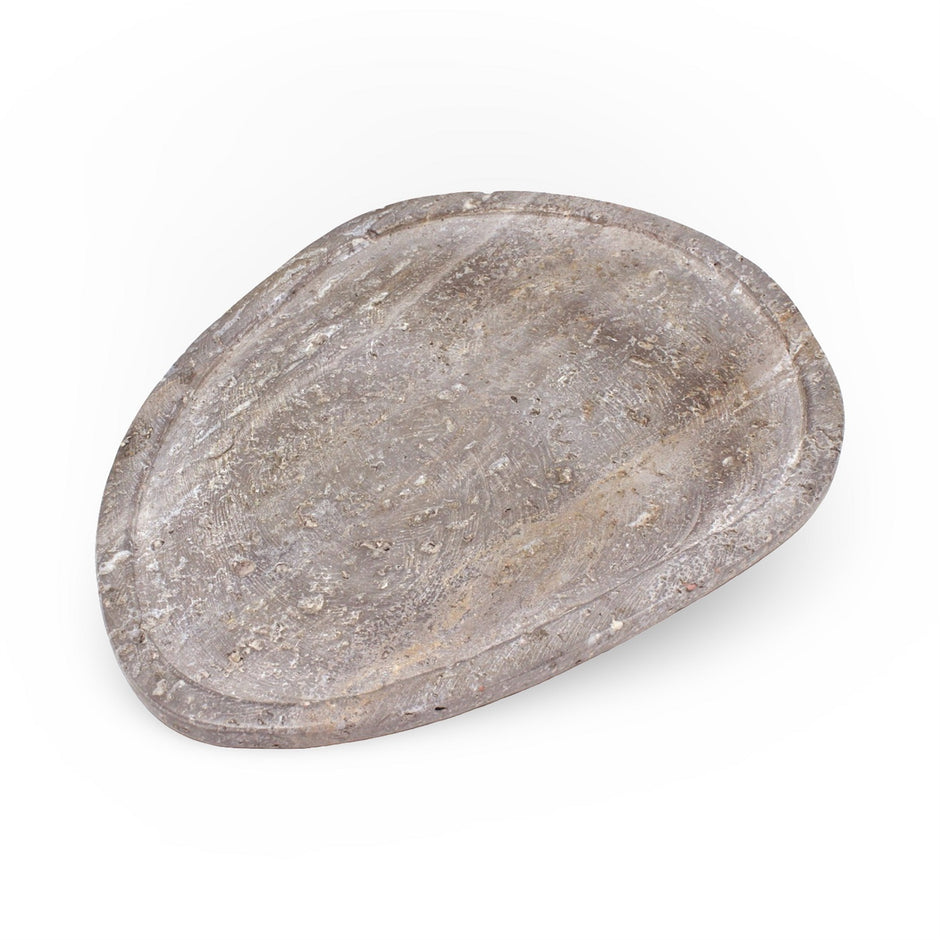 Grey Travertine Organic Platter tray by BIDK, showcasing a natural textured surface with organic shape and smooth edges.
