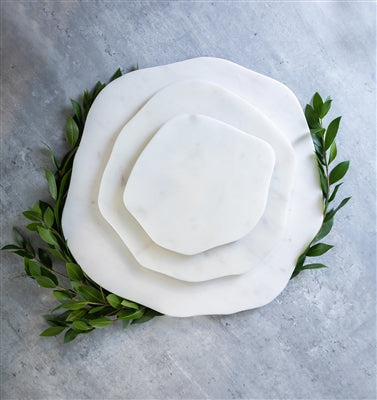 Small organic shape white marble tray by BIDK, featuring smooth curves and polished surface for elegant display or serving.