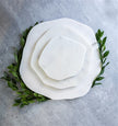 Small organic shape white marble tray by BIDK, featuring smooth curves and polished surface for elegant display or serving.