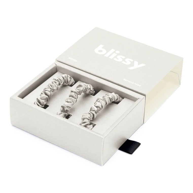 Three skinny white Blissy Scrunchies from the gift and wellness collection, displayed together in a 3-pack.