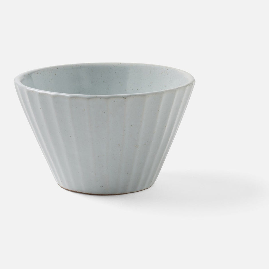 White ceramic cereal and ice cream bowl from Blue Pheasant's Nathalie dishware collection, showcasing a clean, elegant design.
