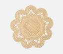 Set of four Blue Pheasant Belladonna natural round placemats with a textured, elegant design for dining decor.