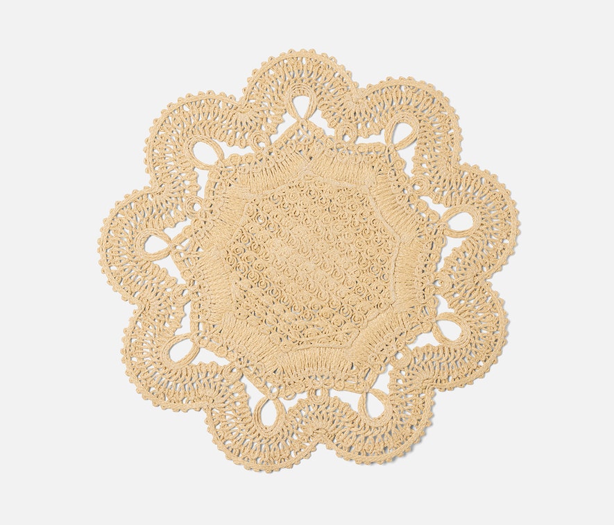 Set of four Blue Pheasant Belladonna natural round placemats with a textured, elegant design for dining decor.