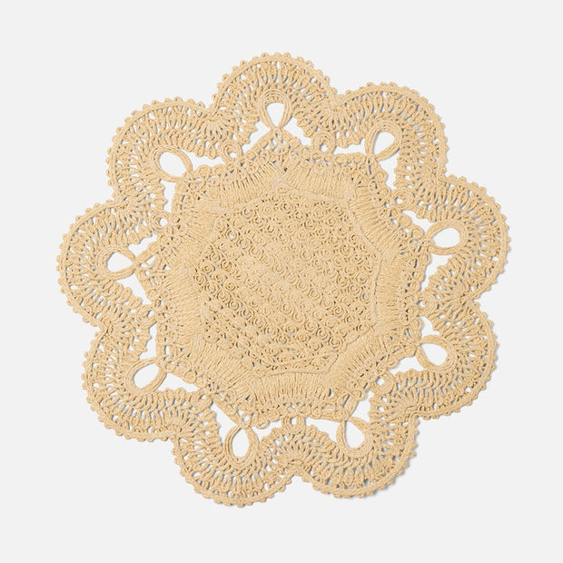Set of four Blue Pheasant Belladonna natural round placemats with a textured, elegant design for dining decor.