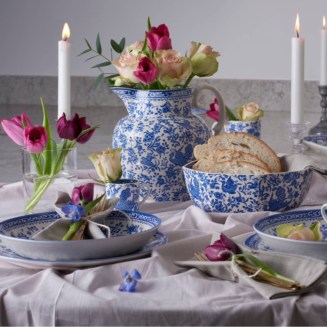 Blue Regal Peacock medium plate by Burleigh featuring intricate peacock feather design and classic porcelain craftsmanship.