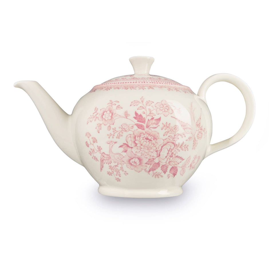 Large pink Asiatic Pheasants teapot by Burleigh featuring a floral design and a classic shape on a white background.