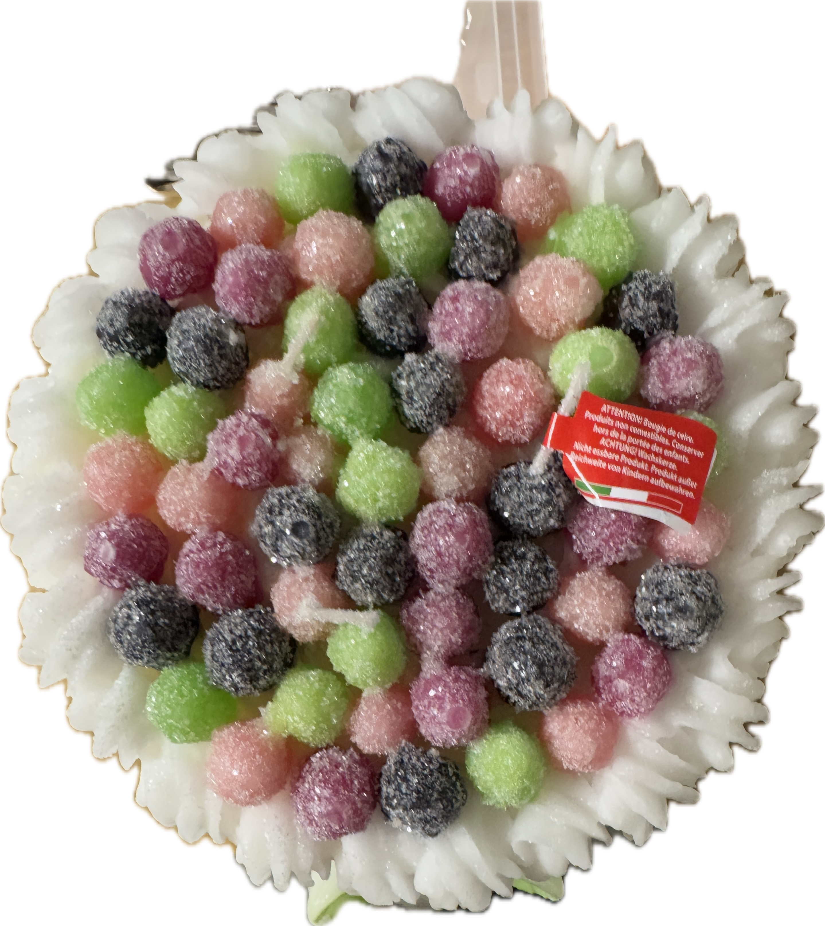Cereria Introna blackberry cake pillar candle with green icing and candle flame, decorative and scented home decor.