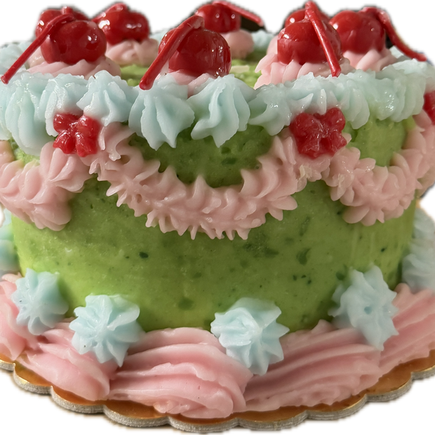 Multi-color Cereria Introna Retro Cake pillar candle with layered, vintage-style design, perfect for decorative use.