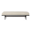 Cisco Lincoln Bench upholstered in Marvell Ivory, showcasing a plush, padded seat with elegant wooden legs for stylish seating.