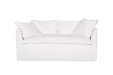 Cisco Havana curved slipcovered loveseat in white linen, 72-inch, showcasing plush cushions and elegant design.