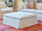 Cisco Sage Square Ottoman Slipcovered in Brevard Birch fabric, showcasing a modern, slipcovered design with a comfortable, square shape.