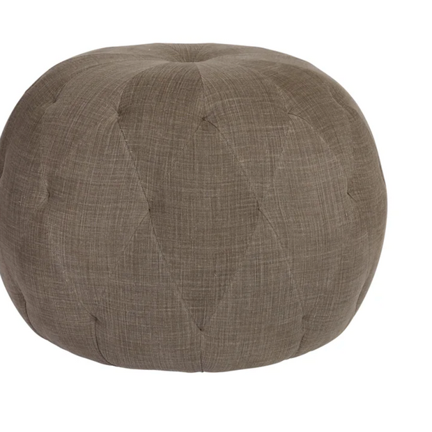 Cisco tufted round pouf in spicy rye color, soft fabric with a plush, tufted surface for comfortable seating or decor accents.