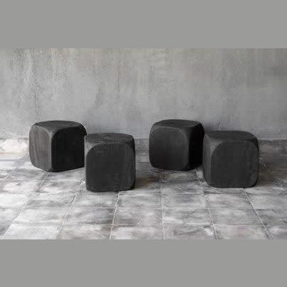Black teak dice cube side table by Clubcu/Blaxsand showing a modern, geometric design with a smooth black finish.