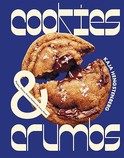 Book cover of 'Cookies & Crumbs' with a chocolate chip cookie on a blue background