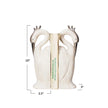 Set of two Creative Co-op heron-shaped bookends with detailed bird designs, perfect for organizing books on a shelf.