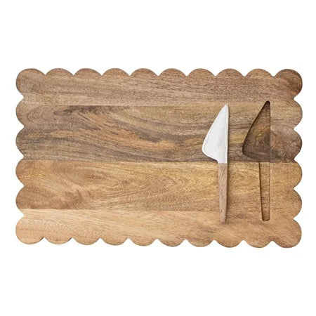 Set of two mango wood scalloped serving boards from Creative Co-op, ideal for cheese and snacks, with elegant curved edges.