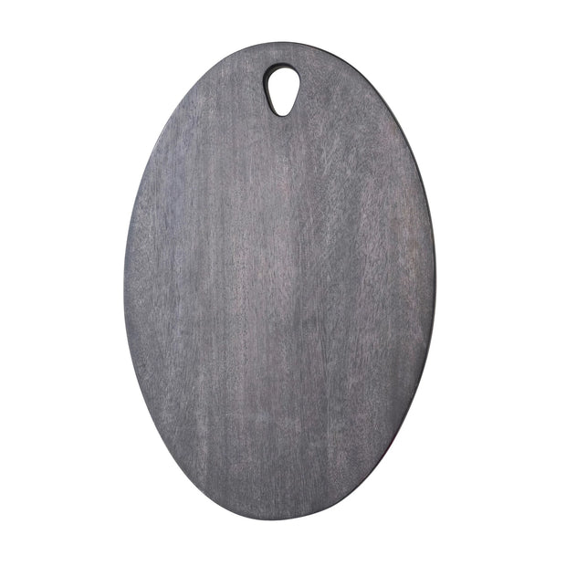 Oval mango wood serveware board with handle, ideal for serving cheese, charcuterie, or appetizers in a stylish kitchen setting.