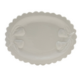 Stoneware scalloped platter with embossed pears, Creative Co-op serveware for elegant food presentation.