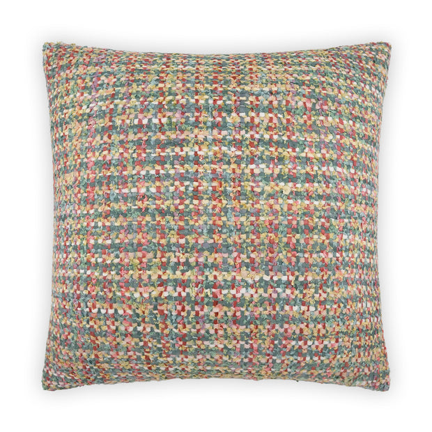 Multicolored patterned pillow on a white background