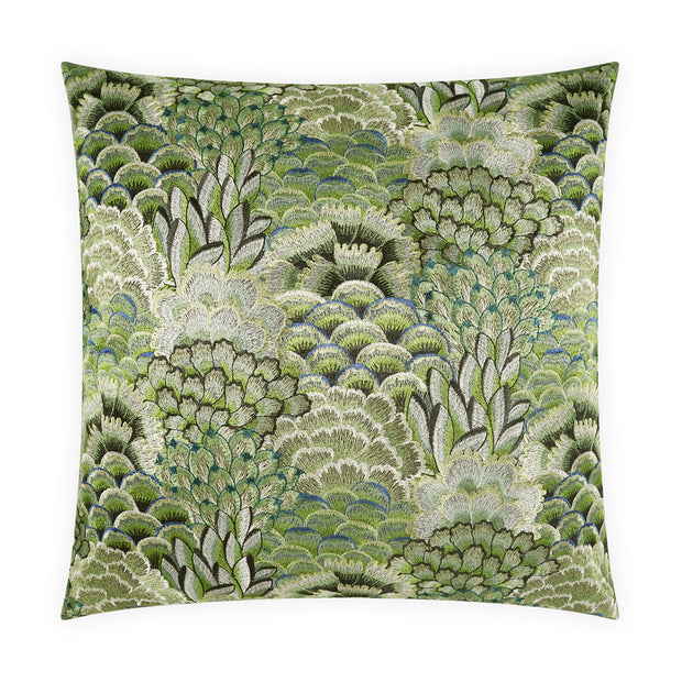 Decorative pillow with green and white floral pattern on a white background