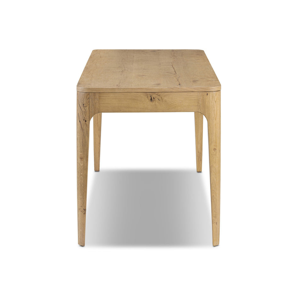 Four Hands Burke Desk with sleek wooden surface and modern design, ideal for home or office workspace.