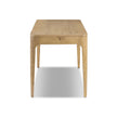 Four Hands Burke Desk with sleek wooden surface and modern design, ideal for home or office workspace.