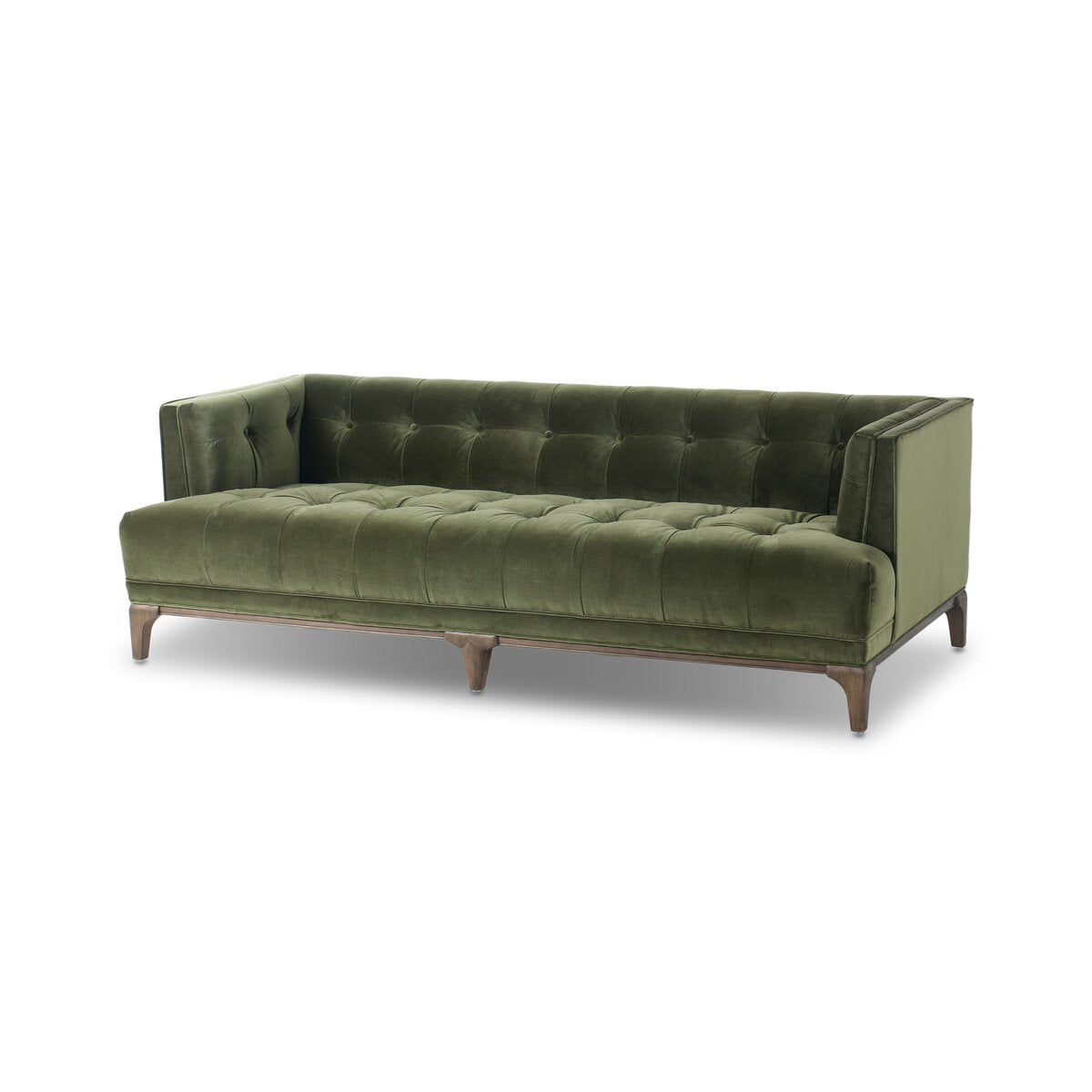 Olive green Dylan velvet tufted sofa by Four Hands, 78 inches long, with plush cushions and tufted back in a modern living room setting.